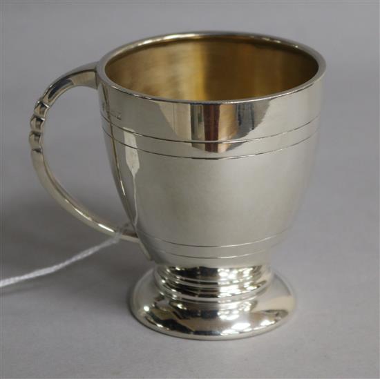 A 1960s silver christening mug, J.B. Chatterley & Sons Ltd, Birmingham, 1960, 3 oz.